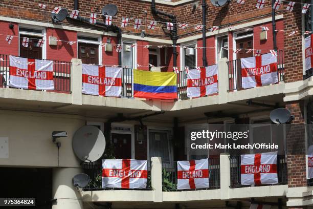 Residents decorate their properties within the Kirby Estate in Bermondsey with St George flags and bunting of show support for England at the FIFA...