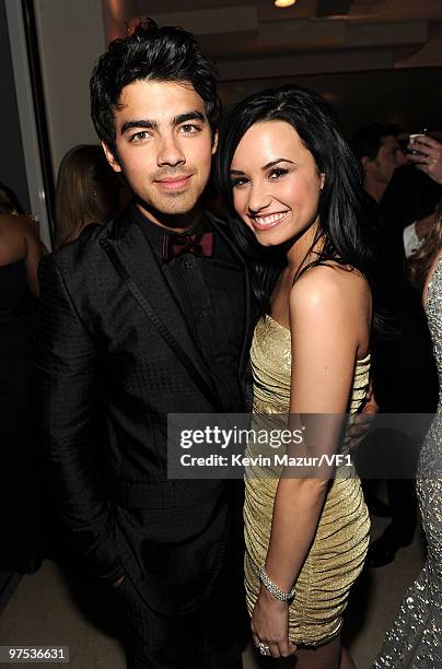 Joe Jonas and Demi Lovato attends the 2010 Vanity Fair Oscar Party hosted by Graydon Carter at the Sunset Tower Hotel on March 7, 2010 in West...