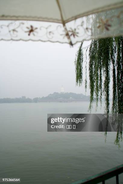 rain beihai park - beihai stock pictures, royalty-free photos & images