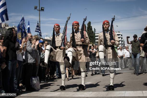 Changing of the guard front of the Greek Parliament at the demonstration. People demonstrated in Syntagma square, Athens, in protest at the Greek...