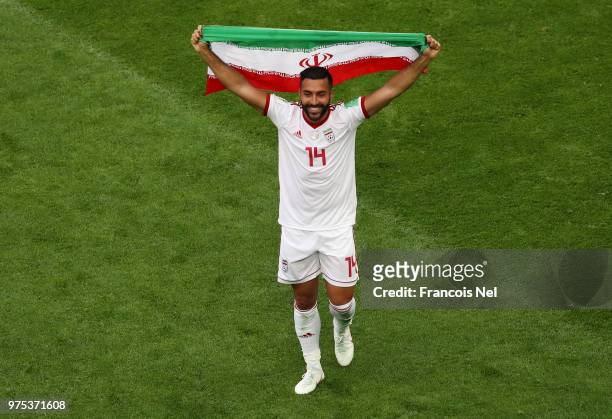 Saman Ghoddos of Iran celebrates his side's win following the 2018 FIFA World Cup Russia group B match between Morocco and Iran at Saint Petersburg...