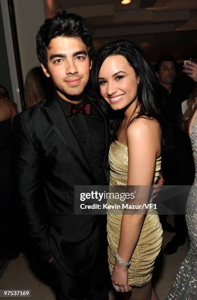 Joe Jonas and Demi Lovato attends the 2010 Vanity Fair Oscar Party hosted by Graydon Carter at the Sunset Tower Hotel on March 7, 2010 in West...