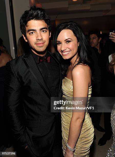 Joe Jonas and Demi Lovato attends the 2010 Vanity Fair Oscar Party hosted by Graydon Carter at the Sunset Tower Hotel on March 7, 2010 in West...