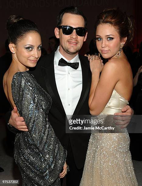 Nicole Richie, musician Joel Madden and singer Miley Cyrus attend the 18th Annual Elton John AIDS Foundation Oscar party held at Pacific Design...
