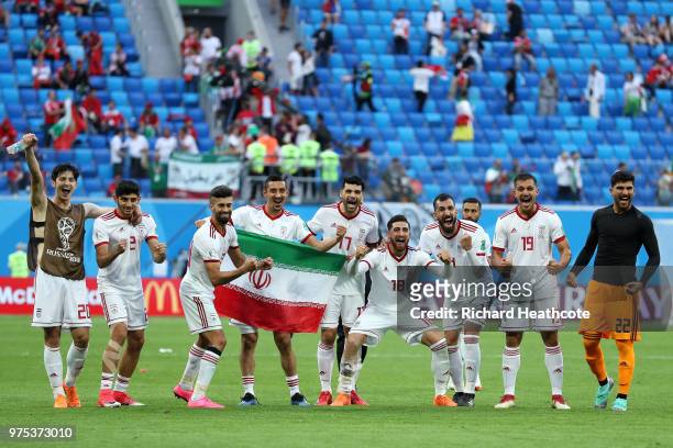 Iran players celebrate their sides victory after the 2018 FIFA World Cup Russia group B match between Morocco and Iran at Saint Petersburg Stadium on...