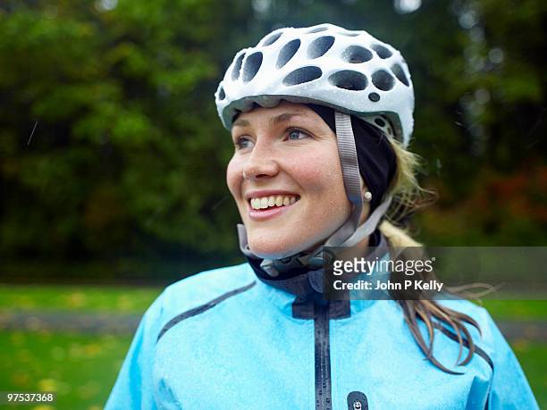 portrait of woman cyclist - john p kelly stock pictures, royalty-free photos & images