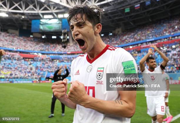 Sardar Azmoun of Iran celebrates following his side's win during the 2018 FIFA World Cup Russia group B match between Morocco and Iran at Saint...