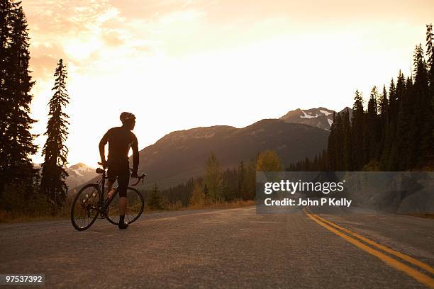 road cyclist silhouette - john p kelly stock pictures, royalty-free photos & images