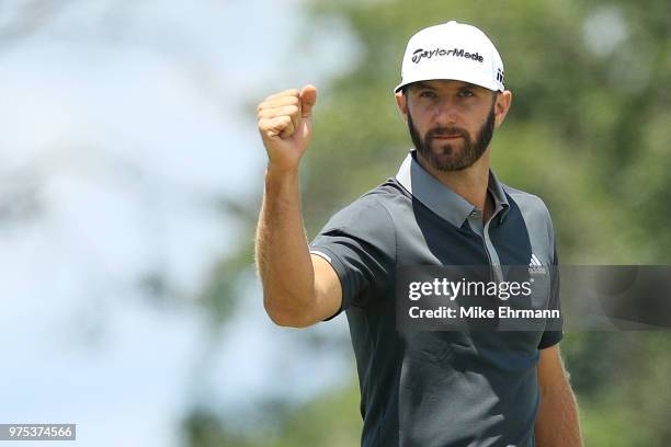 Dustin Johnson of the United States celebrates after making a birdie on the seventh hole during the second round of the 2018 U.S. Open at Shinnecock...
