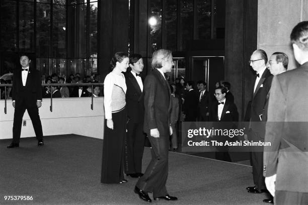 Crown Prince Akihito, Crown Princess Michiko and Prince Naruhito greet on arrival at the NHK Hall to attend the New York Metropolitan Opera...