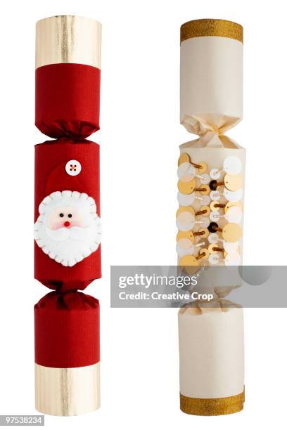 two christmas crackers - creative rf stock-fotos und bilder