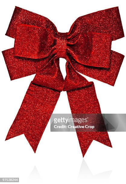 red glittery bow - creative rf stock pictures, royalty-free photos & images