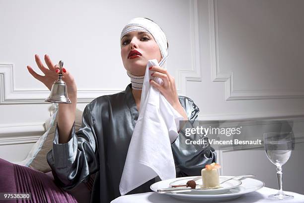 luxurious woman and plastic surgery moment - hand bell stock pictures, royalty-free photos & images