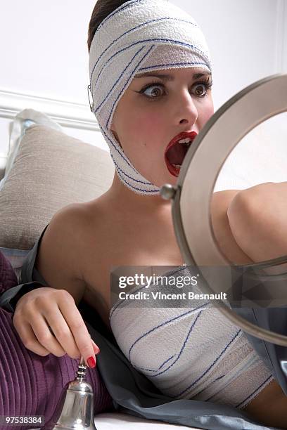 luxurious woman and plastic surgery moment - hand bell stock pictures, royalty-free photos & images