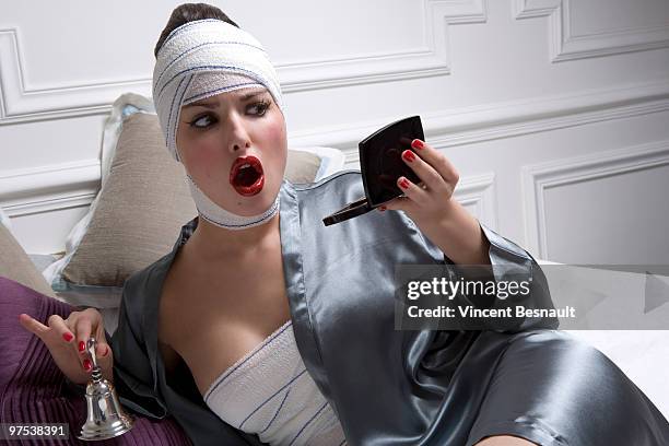 luxurious woman and plastic surgery moment - hand bell stock pictures, royalty-free photos & images