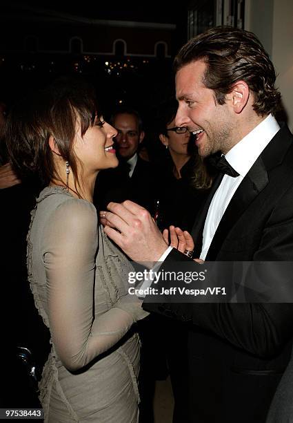 Actors Rashida Jones and Bradley Cooper attend the 2010 Vanity Fair Oscar Party hosted by Graydon Carter at the Sunset Tower Hotel on March 7, 2010...