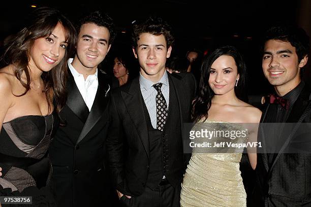 Danielle Jonas and musicians Kevin Jonas, Nick Jonas, Demi Lovato, and Joe Jonas attend the 2010 Vanity Fair Oscar Party hosted by Graydon Carter at...