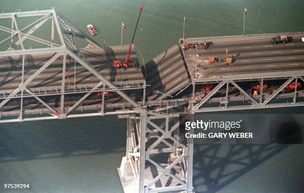 Photo shot 22 OCT 89 shows a collapsed portion of the Bay Bridge at Oakland after the earthquake that rocked northern California.