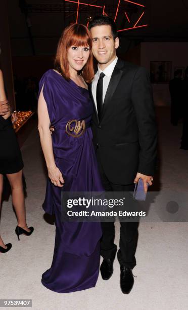 Actress Molly Ringwald and her husband Panio Gianopoulos attend the Elton John AIDS Foundation Oscar Viewing Party at the Pacific Design Center on...