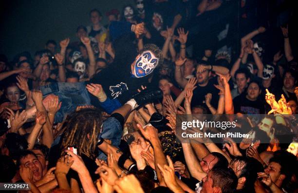 Insane Clown Posse perform on stage, crowd usrfing over audience, at the Hi Fi Bar on 17th May 2003 in Melbourne, Australia.