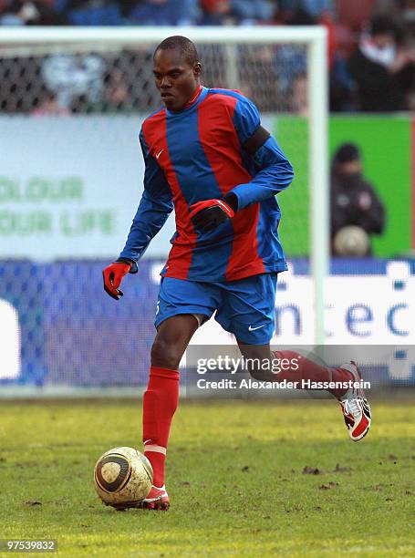 Fritzon Baptiste of Haiti runs with the ball during the charity match for earthquake victims in Haiti between ran Allstar team and National team of...