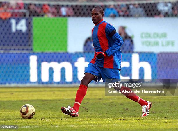 Fritzon Baptiste of Haiti runs with the ball during the charity match for earthquake victims in Haiti between ran Allstar team and National team of...