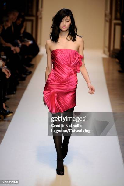 Model walks down the runway during the Emanuel Ungaro fashion show as part of Paris Fashion Week on March 8, 2010 in Paris, France.