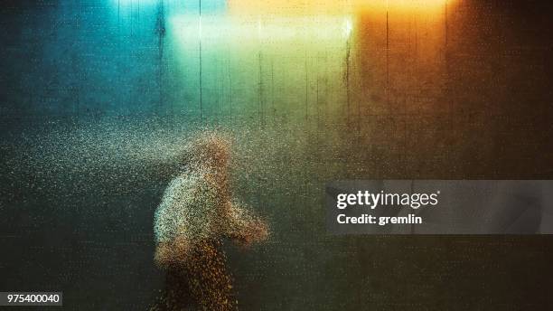 surrealistisch zakenman lopen in een donker steegje - disappear stockfoto's en -beelden