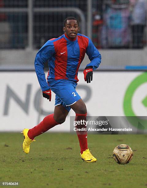 Sertile Retinal of Haiti runs with the ball during the charity match for earthquake victims in Haiti between ran Allstar team and National team of...