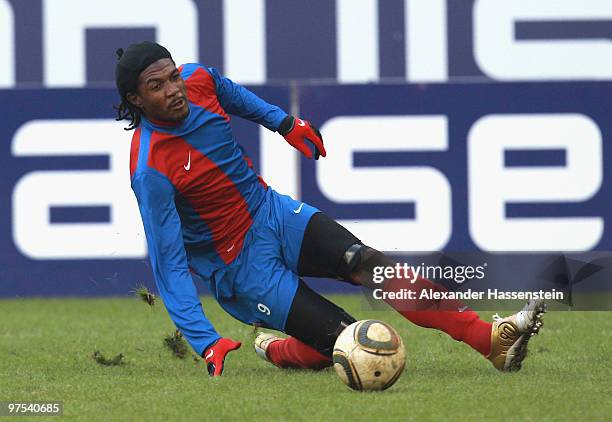 Eliphene Cadet of Haiti runs with the ball during the charity match for earthquake victims in Haiti between ran Allstar team and National team of...