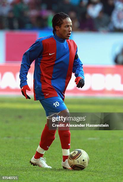 Charles Herold of Haiti runs with the ball during the charity match for earthquake victims in Haiti between ran Allstar team and National team of...