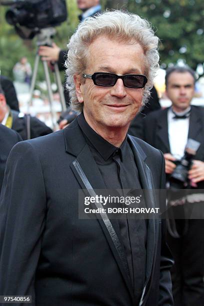 Canadian composer Luc Plamondon arrives for the official projection of the film "The Edukators", 17 May 2004, at the 57th Cannes Film Festival in the...