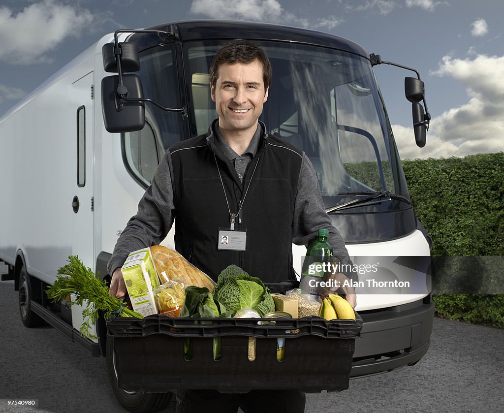 Delivery Driver Barnyard Delivery Driver With Basket Of Food High-Res Stock Photo - Getty Images