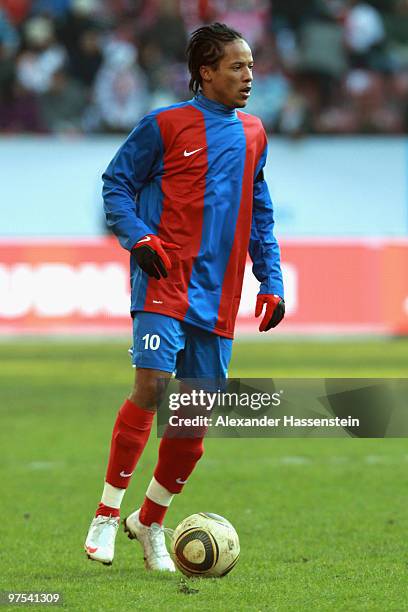 Charles Herold of Haiti runs with the ball during the charity match for earthquake victims in Haiti between ran Allstar team and National team of...