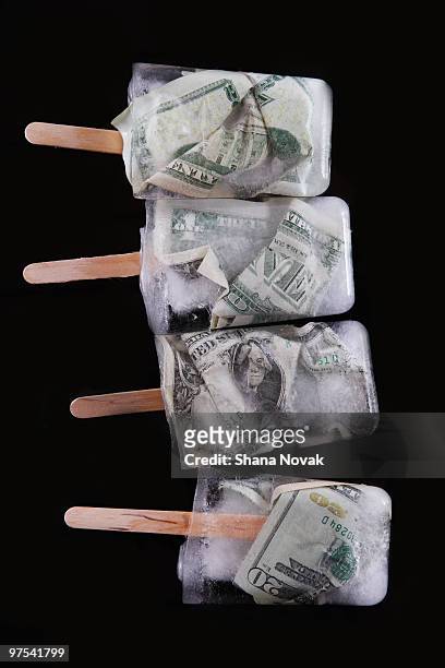 paper bill popsicles - shana novak stock pictures, royalty-free photos & images