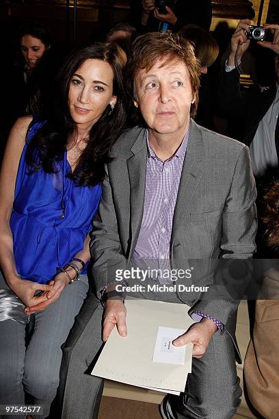 Nancy Shevel and Sir Paul McCartney attend the Stella McCartney Ready to Wear show as part of the Paris Womenswear Fashion Week Fall/Winter 2011 at...
