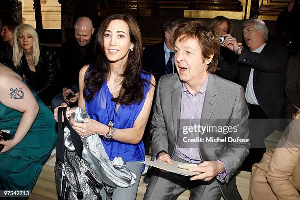 Nancy Shevel and Sir Paul McCartney attend the Stella McCartney Ready to Wear show as part of the Paris Womenswear Fashion Week Fall/Winter 2011 at...