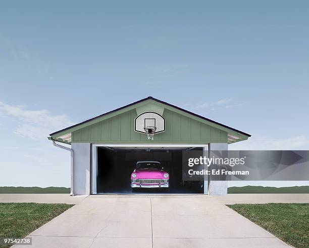 classic car in suburban garage - car in driveway stock-fotos und bilder