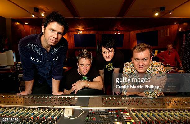 Andy Strachan, Scott Owen, Chris Cheney of The Living End with Jimmy Barnes in a recording studio control room on 17th September 2004 in Melbourne,...