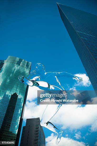 invisible man hurdling between buildings - invisible man stock pictures, royalty-free photos & images