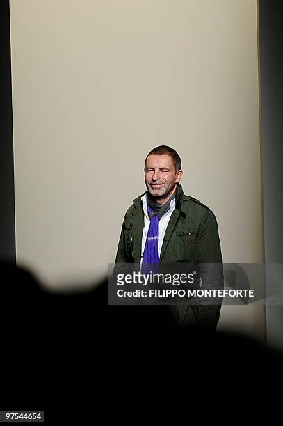 German designer Tomas Maier acknowledges the audience at the end of Bottega Veneta Fall-Winter 2010-2011 ready-to-wear collection on February 27,...