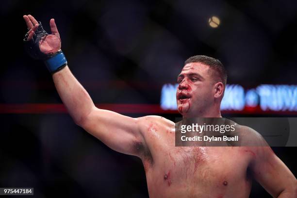 Tai Tuivasa of Australia celebrates after his heavyweight bout against Andrei Arlovski of Belarus during the UFC 225: Whittaker v Romero 2 event at...