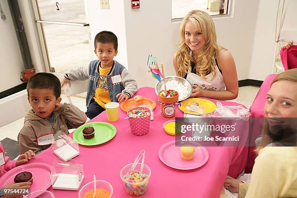 Tiffany Thornton making cupcakes with kids from the Starlight Childrens Foundation at the Polkatots Cupcakes Celebrity Launch party at Polkatots...