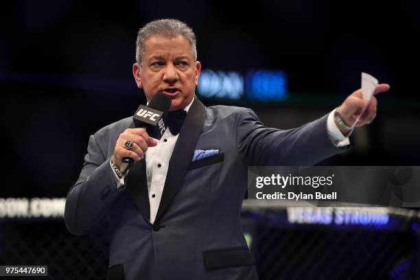 Octagon announcer Bruce Buffer introduces Dan Ige and Mike Santiago before their featherweight bout during the UFC 225: Whittaker v Romero 2 event at...