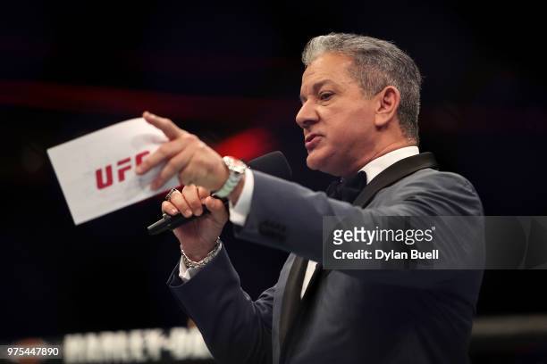 Octagon announcer Bruce Buffer introduces Dan Ige and Mike Santiago before their featherweight bout during the UFC 225: Whittaker v Romero 2 event at...