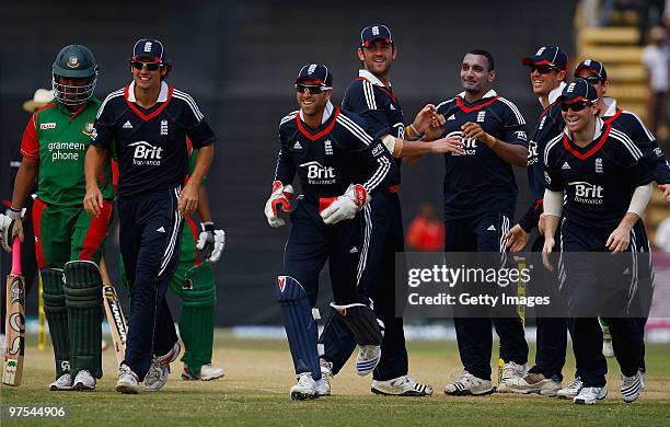 England players celebrate bowler Ajmal Shahzad's first ODI wicket with the dismissal of Bangladesh batsman Tamin Iqbal during the 3rd ODI between...