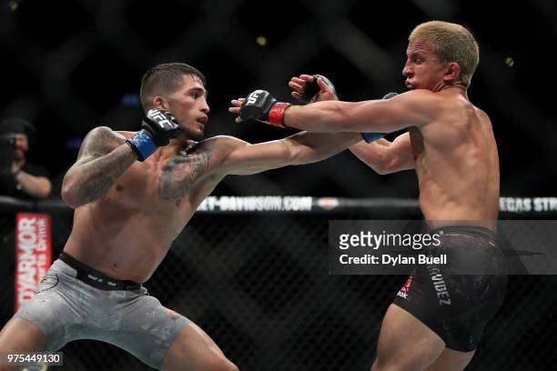 Sergio Pettis lands a punch on Joseph Benavidez in the second round in their flyweight bout during the UFC 225: Whittaker v Romero 2 event at the...