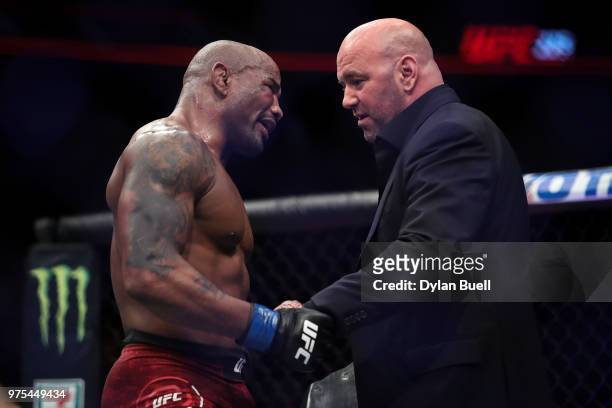 Yoel Romero of Cuba meets with UFC President Dana White after his middleweight title fight against Robert Whittaker of New Zealand during the UFC...