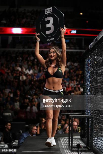 Octagon Girl Arianny Celeste signals the start of the third round of the heavyweight bout between Andrei Arlovski of Belarus and Tai Tuivasa of...