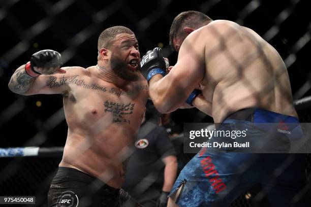 Rashad Couler attempts a punch against Chris De La Rocha in the first round in their heavyweight bout during the UFC 225: Whittaker v Romero 2 event...